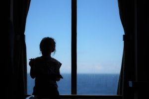 Ferry to France with Children 5 year old silhouette at window